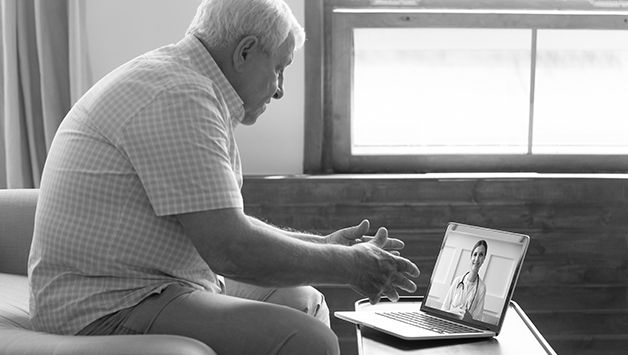 senior man on telehealth call with doctor